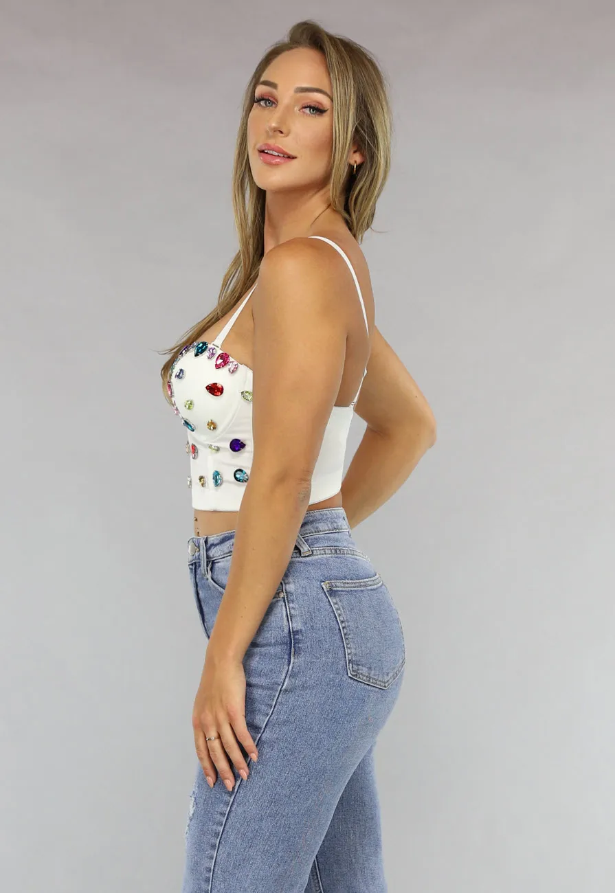 Weißes Bustier mit großen mehrfarbigen Strasssteinen